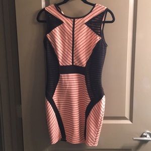 Coral cocktail dress with black stripes